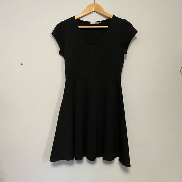 Cute black stretch dress with skater skirt - Picture 1 of 4